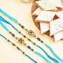 Four Designer Rakhis with Kaju Katli Sweets