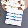 Triple Evil Eye Rakhi with Kaju Katli