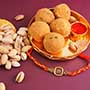 Spiritual Om Golden Rakhi with Puja Thali for Brother