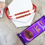 Pair of Rudraksha Rakhis with Dairy Milk Silk To Hong Kong