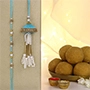 Teal Jhumar Lumba Pearl Rakhi Set N Besan Laddoo Surprise
