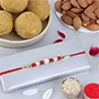 Nityam Creation Regular Ethnic Pearl Rakhi with Besan Laddoo