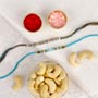 Pleasant Rakhi Set with Cashew Nuts