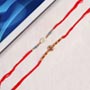 Pleasing Diamond Set of Two Rakhis For UK