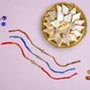 Adorable Designer Rakhi Set with Kaju Katli Sweet For UK