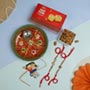 Three Amazing Rakhis With Puja Thali Sweet Dry Fruit Hamper For UK