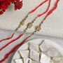 Three Beautiful Rakhis with Kaju Katli For UK