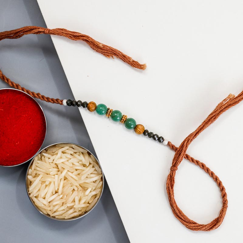 Authentic Rakhi Send Aboriginal Style Decent Beads Rakhi Online | Rakhibazaar.com