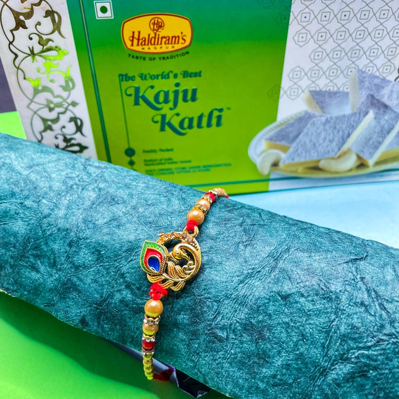 Send Beautiful Peacock Rakhi With Kaju Katli Online | Rakhibazaar.com