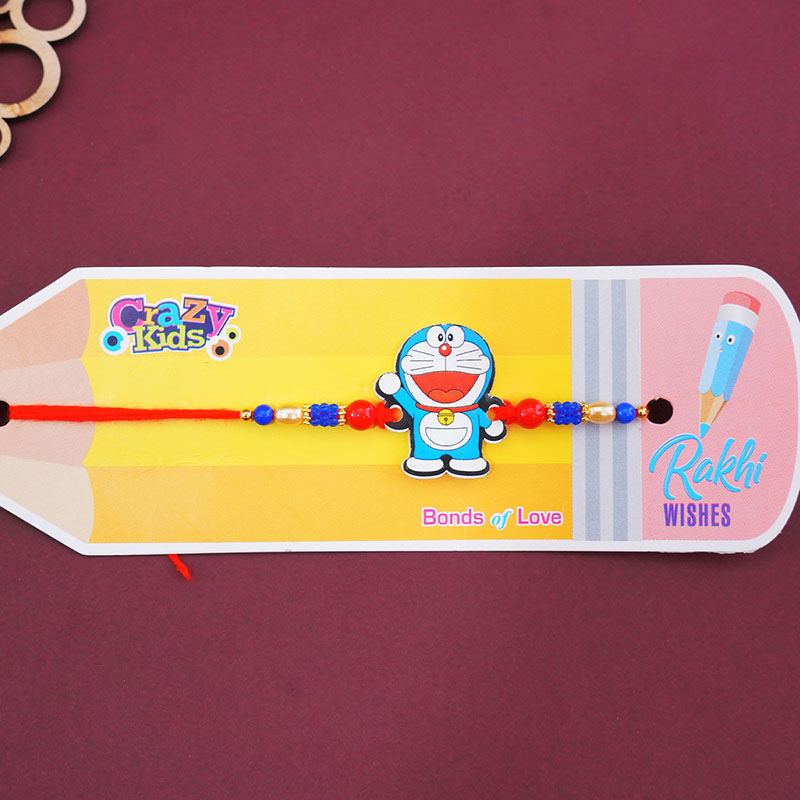 send-doraemon-rakhi-with-sweets-for-little-brother-online-rakhibazaar