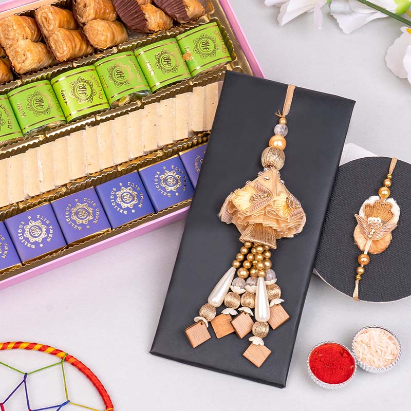 Send Bhaiya Bhabhi Rakhi with Haldiram Sweet Box Online | Rakhibazaar.com