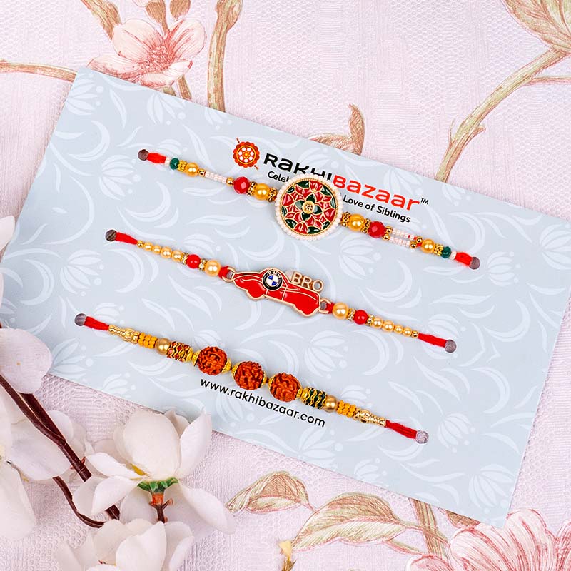 Large Rakhi Send Set of 3 Designer Rakhi with Boondi Laddoo Online | Rakhibazaar.com