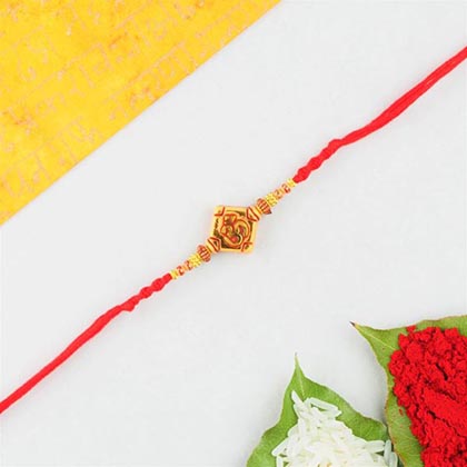 Aum rakhi in red thread