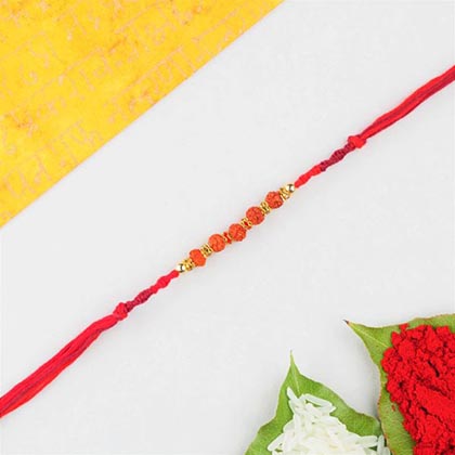 Five rudraksha in red cotton thread rakhi