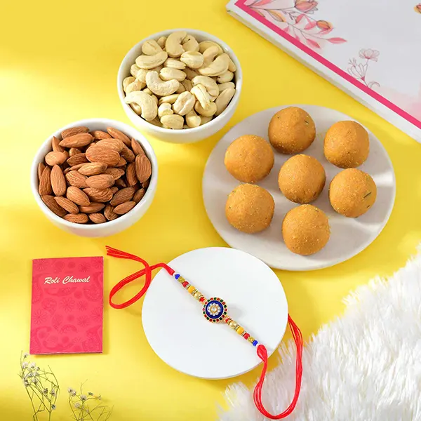 Traditional Colourful floral Rakhi with Dryfruits and Besan Laddu