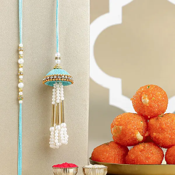 Tranquil Teal Jhumar Bhaiya Bhabhi Pearl Rakhi Set N Ladoo Combo