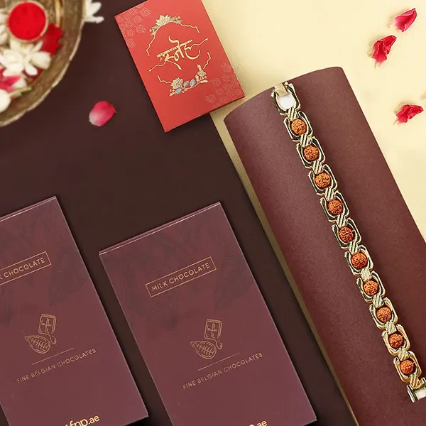 Glamorous Gold Embellished Rudraksh Rakhi N Milk Chocolates