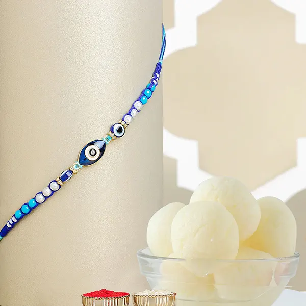 Galactic Blue Protector Evil Eye Rakhi with Rasgulla Tin