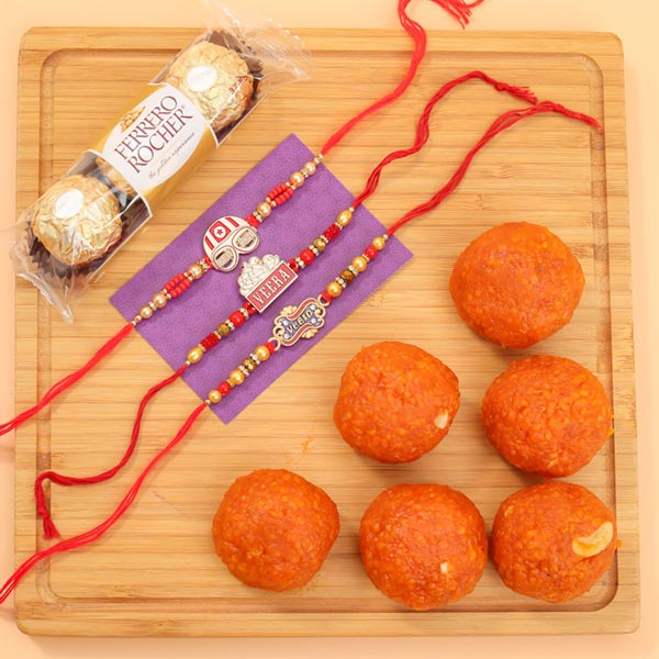 Modern Three Rakhi Set With Laddu And Chocolates