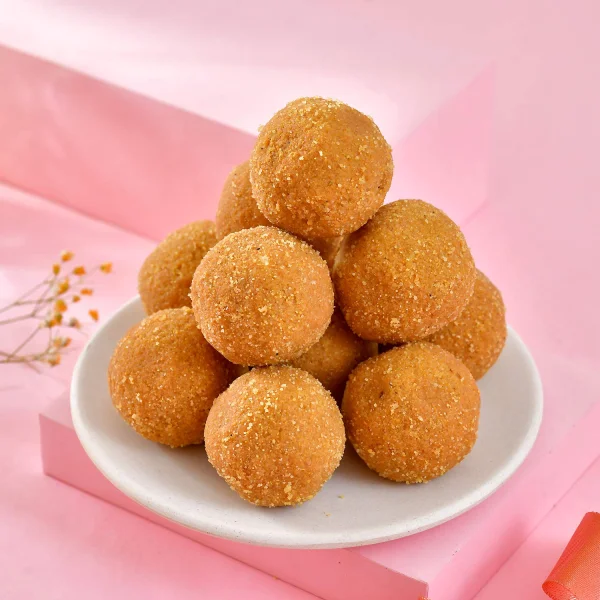 Krishna Bansuri Rakhi Gift Combo with Besan Laddoo