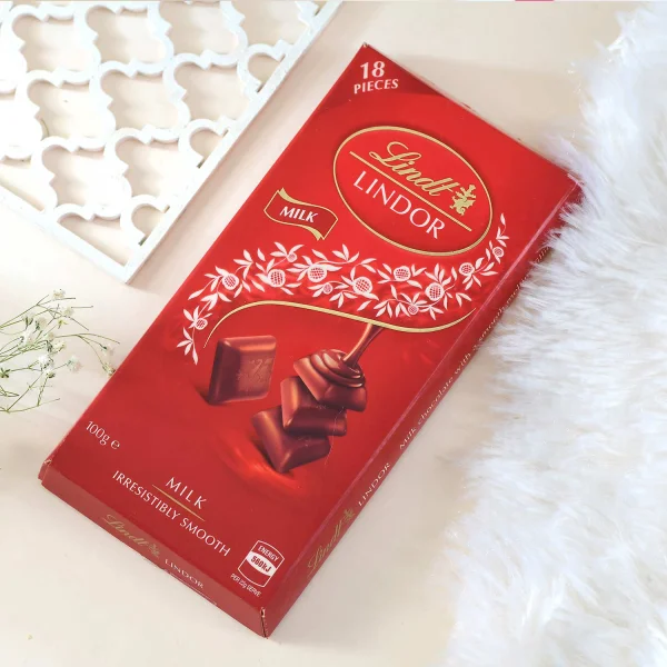 Floral Shaped Rakhi Gift Combo with Lindt Lindor Chocolate