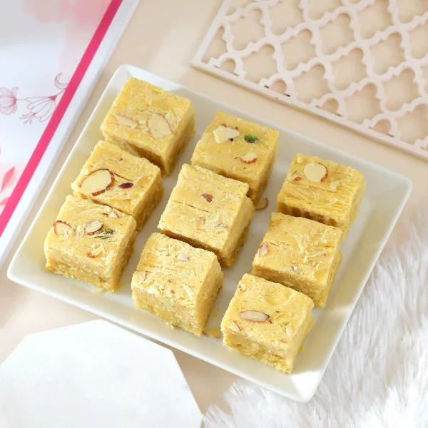 Floral Shaped Rakhi Gift Combo with Soan Papdi