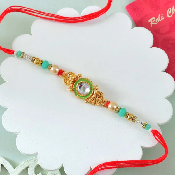 Golden Rakhi Gift Combo with Besan Laddu, Kaju Katli and Chocolates
