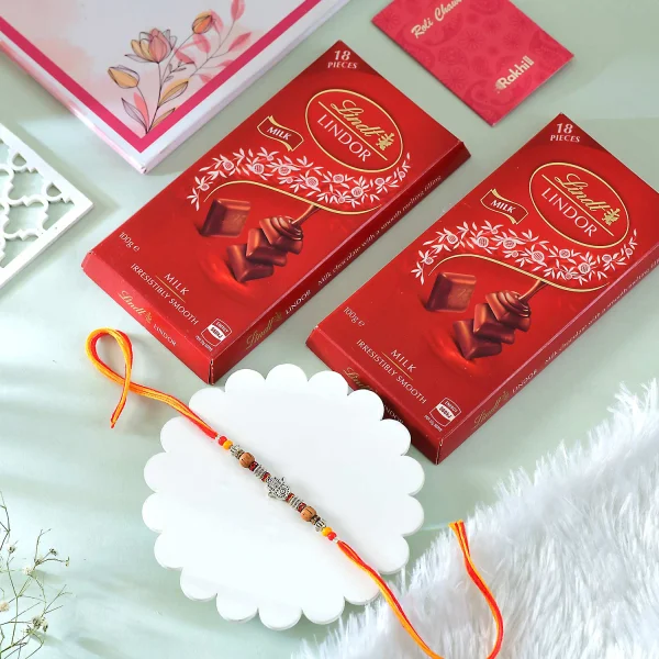 Hamsa Rakhi Gift Combo with Lindt Lindor Milk Chocolates