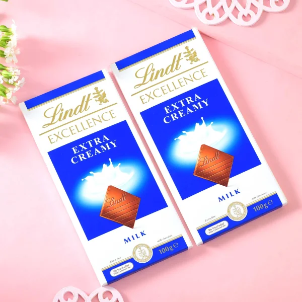 Pack of 2 Rakhi Gift Combo with  Lindt Chocolates & Soan Papdi