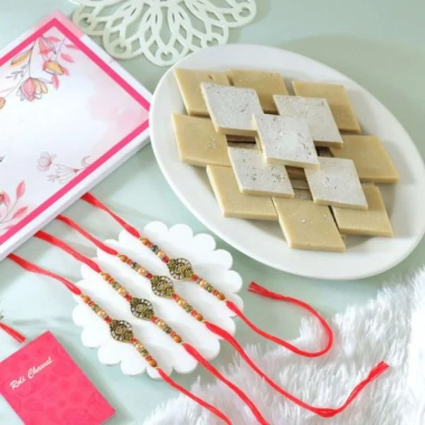 Pack of 4 Om Rakhis Gift Combo with Kaju Katli