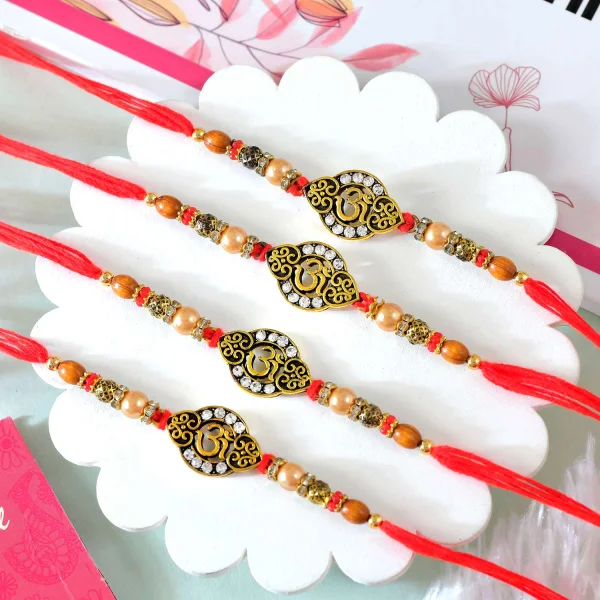 Pack of 4 Om Rakhis Gift Combo with Dryfruits