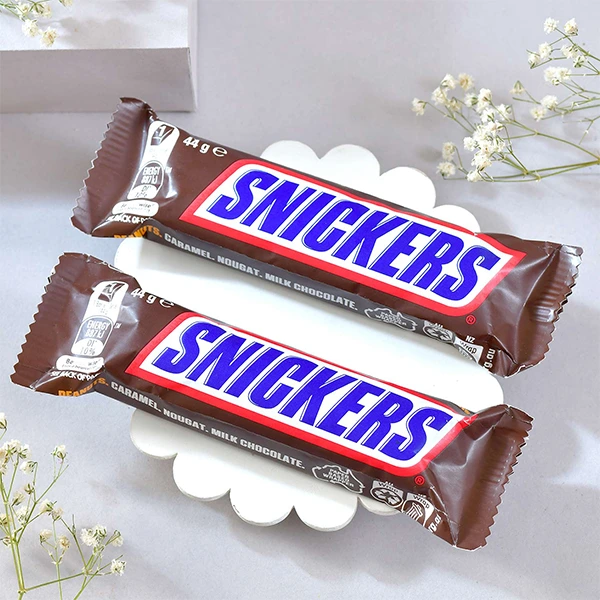 Rudraksha & Evil Eye Protection Rakhi with Snickers Chocolate