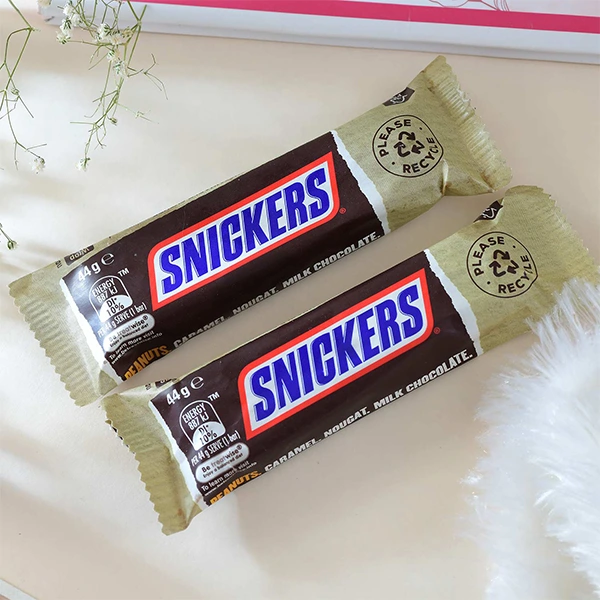 Floral Shape Rakhi Set with Snickers