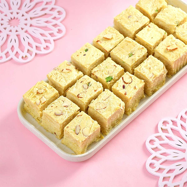 Floral Shape Rakhi Set with Soan Papdi & Cashew