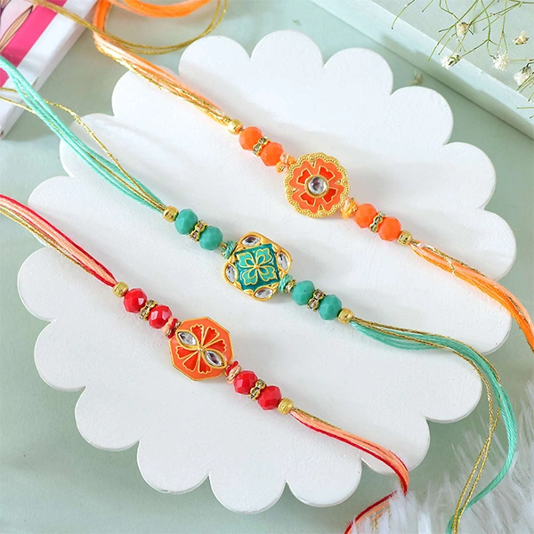 Set of 3 Enchanting Rakhi with Besan Laddoo