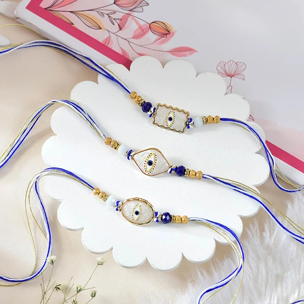 Elegant Evil Eye Rakhi Set with Dryfruits