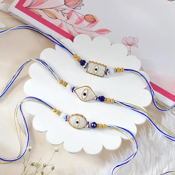 Elegant Evil Eye Rakhi Set with Dryfruits & Kaju katli