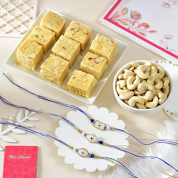 Elegant Evil Eye Rakhi Set with Soan Papdi & Cashew