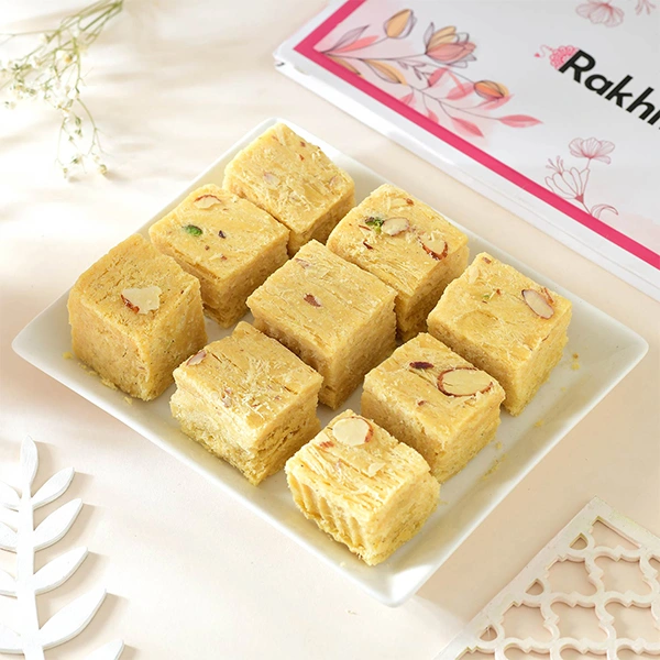Elegant Evil Eye Rakhi Set with Soan Papdi & Cashew