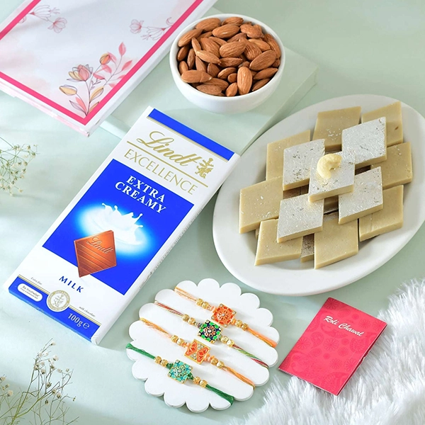 Set of Four Alluring Rakhi with Gourmet Hamper