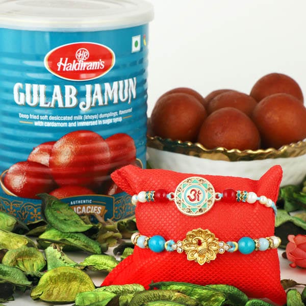 Om & Peacock Rakhis with Gulabjamun