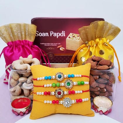 4 Colorful Rakhis, Soan Papdi & Nuts