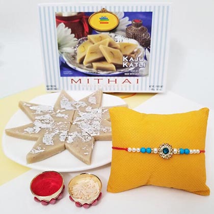 A designer Rakhi with Kaju Katli