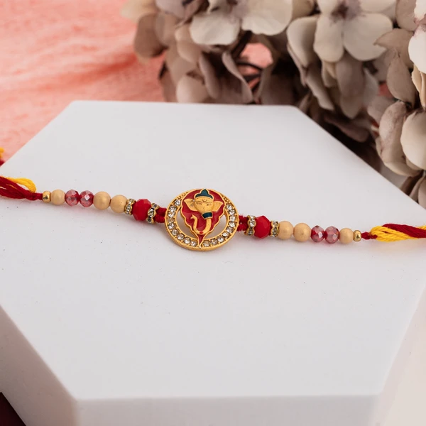 AD Ganesha Rakhi with Ghirardelli Chocolate Gift Box