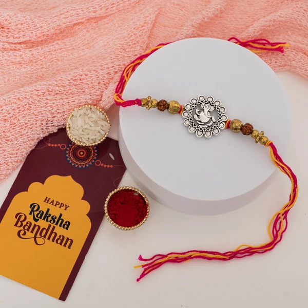Antique Silver Ganesha Rakhi with Spiritual Design