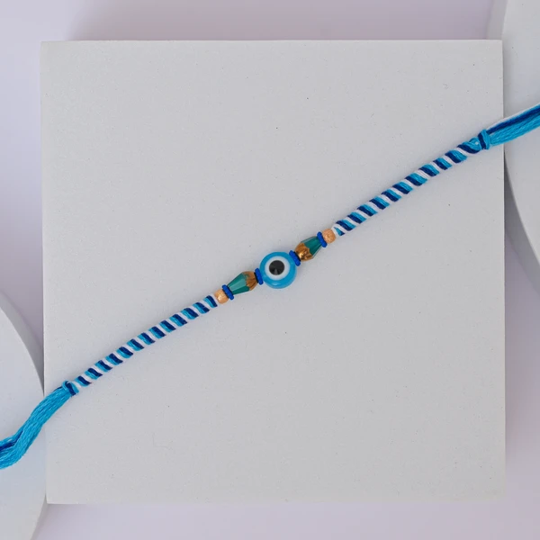 Minimal Evil Eye Rakhi with Ferrero Rocher