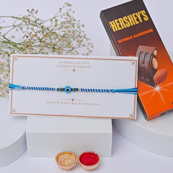 Minimal Evil Eye Rakhi with Hershey
