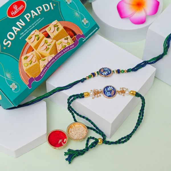 Blue Floral Rakhi Set with Soan Papdi Gift