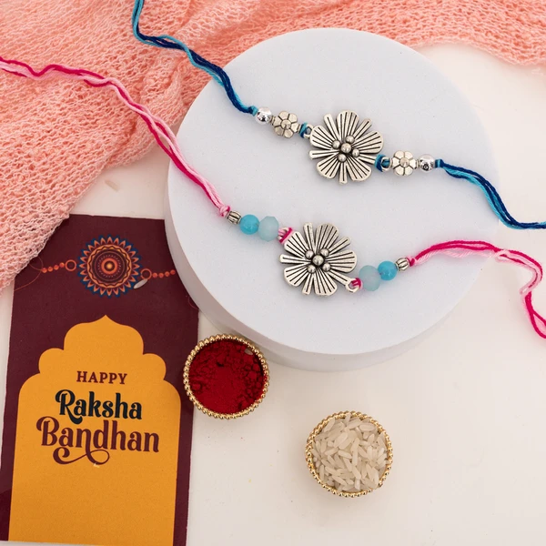 Designer Floral Silver Rakhi Pair