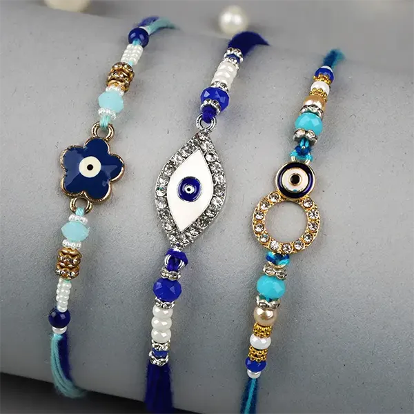 Stunning Set of 3 Blue Designer Rakhi with Complimentary Roli Chawal - For Finland